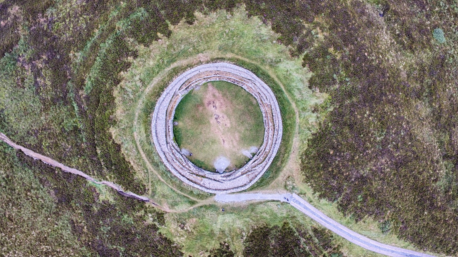 A near-perfect circle in brown heather, 10:57 am.