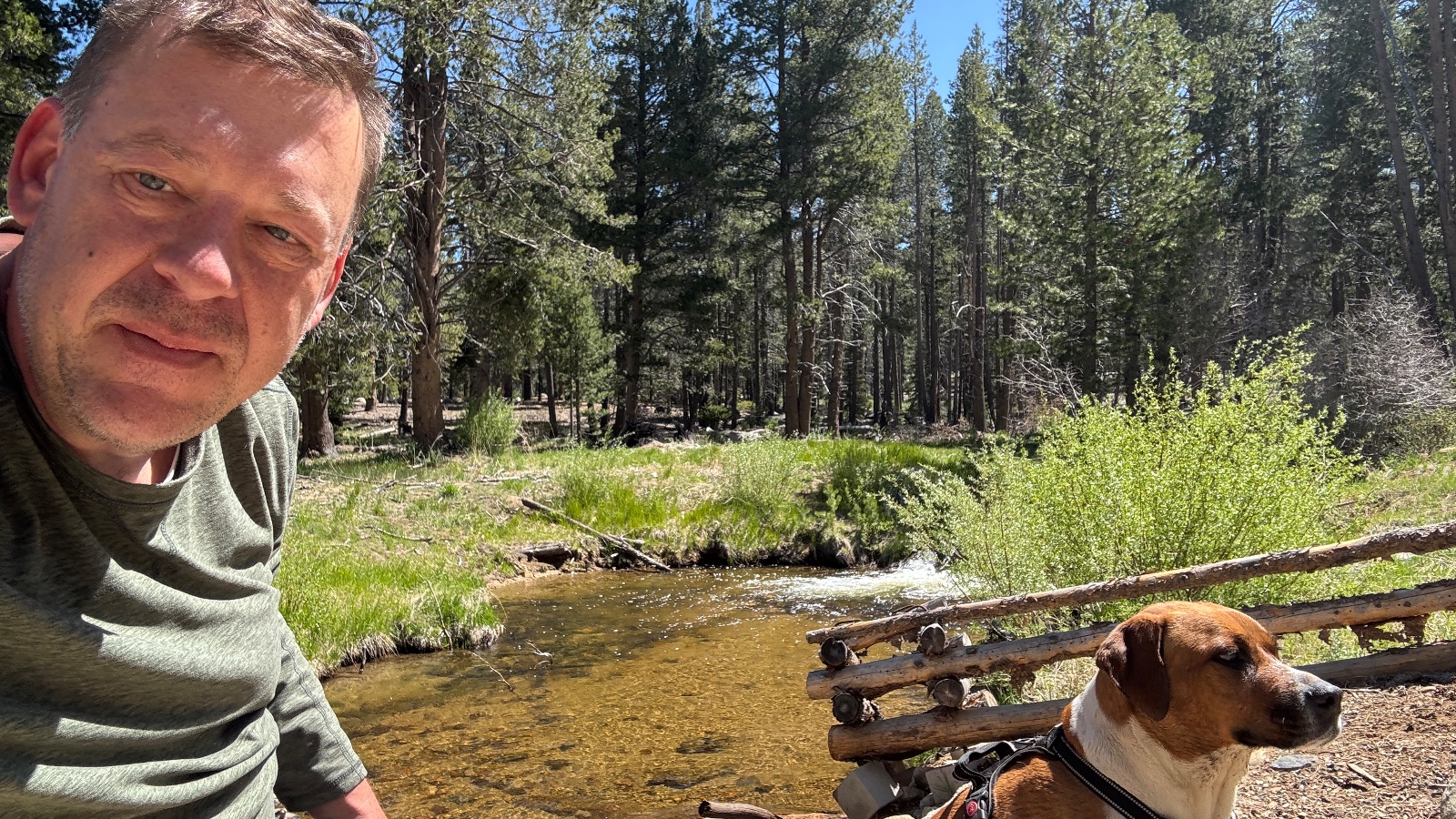 10:58. Down at the creek, helmet off.